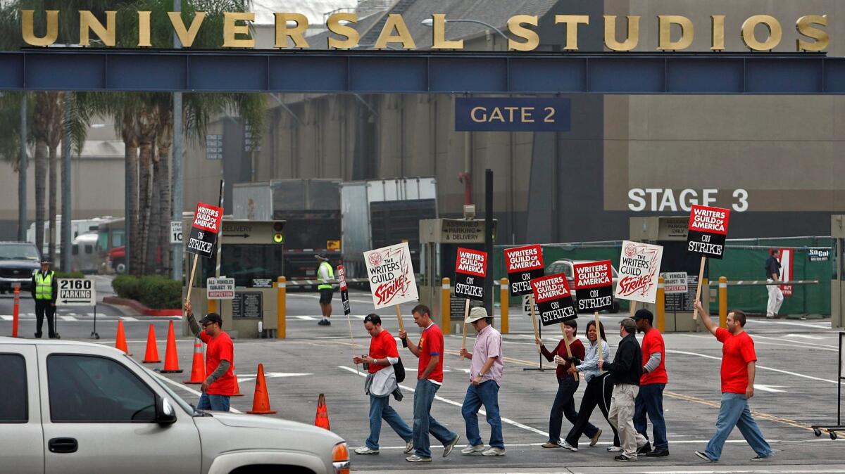 Writers Guild of America strikers in 2007 picket outside Universal Studios. (Allen J. Schaben / Los Angeles Times)