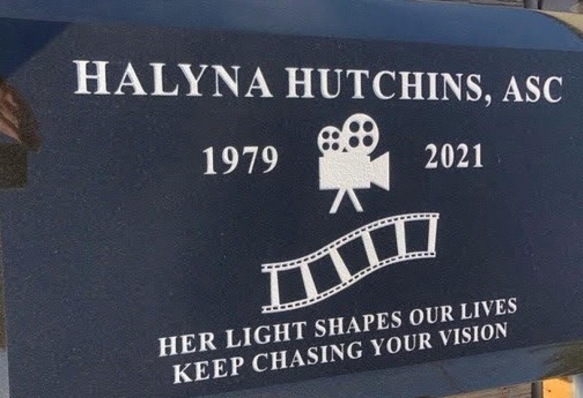 Halyna Hutchins' grave marker reads, "Her light shapes our lives. Keep chasing your vision."