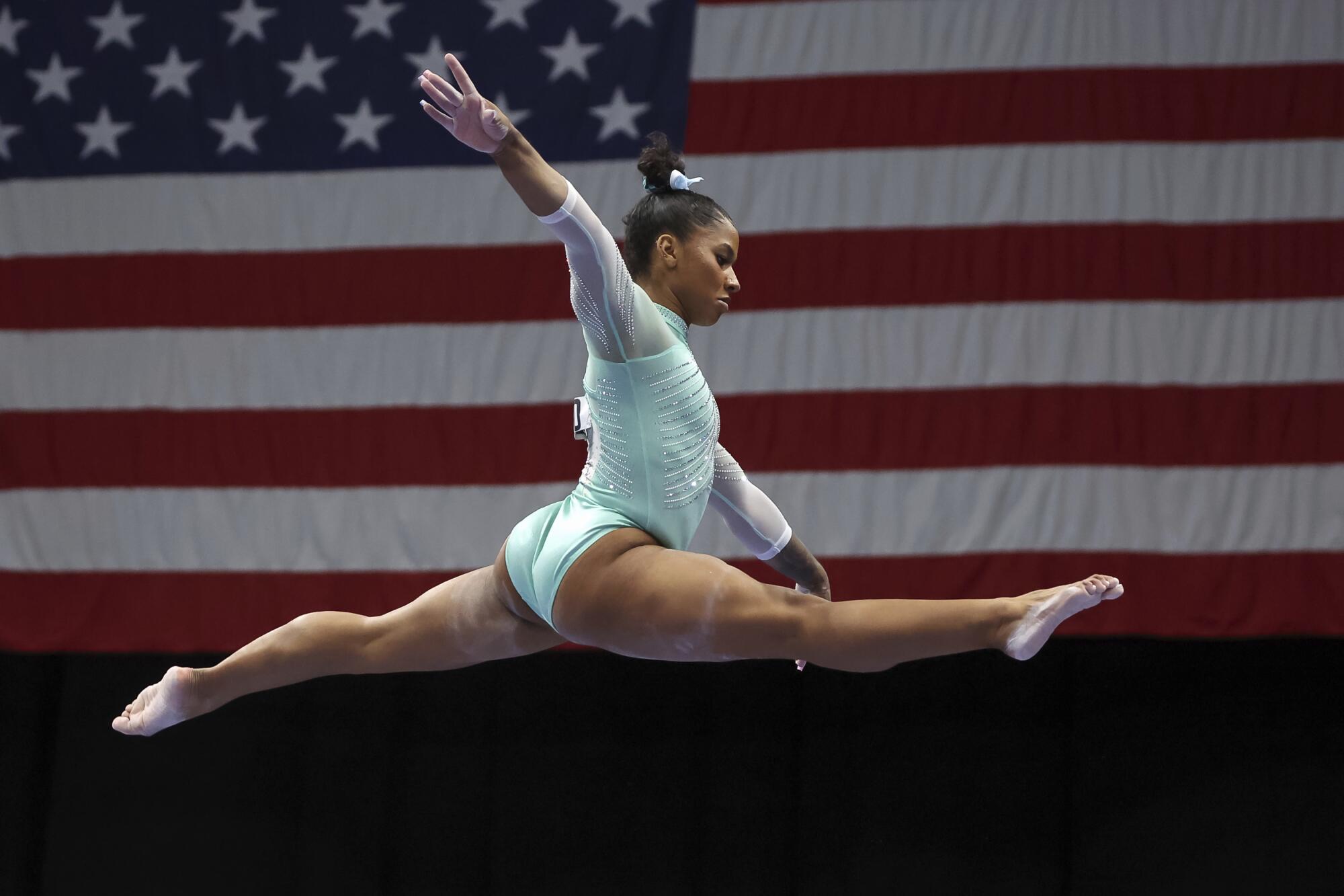 Jordan Chiles competes on the beam during the U.S. Gymnastics Championships in August.