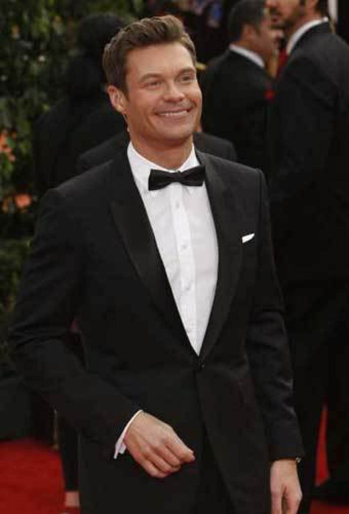 Ryan Seacrest appeared on the red carpet at the 69th Annual Golden Globe Awards show at the Beverly Hilton on Sunday, Jan. 15, 2012.