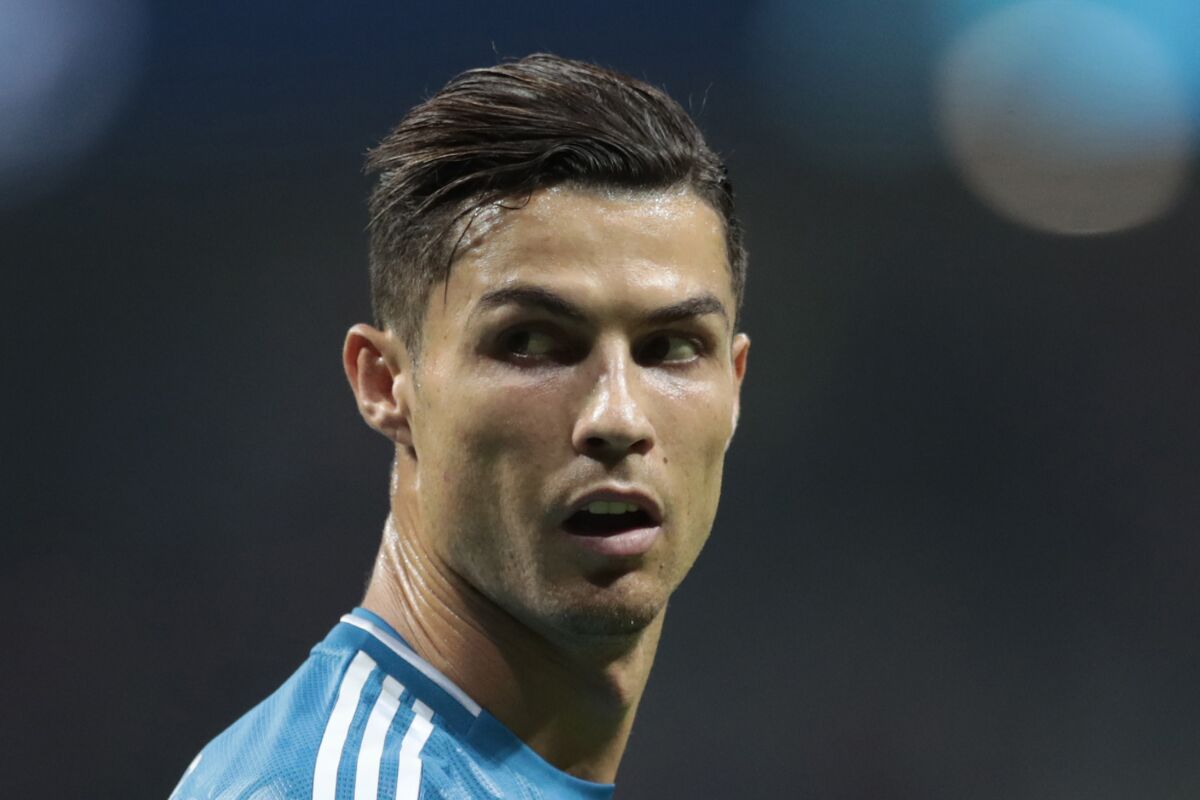 FILE - In this Sept. 18, 2019, file photo, Juventus' Cristiano Ronaldo looks back during a Champions League Group D soccer match in Madrid, Spain. A federal magistrate judge in Nevada is siding with Cristiano Ronaldo's lawyers against a woman who sued for more than the $375,000 in hush money she received in 2010 after claiming the international soccer star raped her in Las Vegas. (AP Photo/Bernat Armangue, File)
