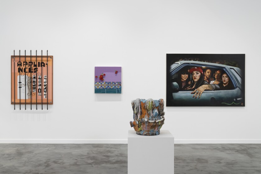 An installation in a gallery shows three paintings on a wall, one showing women cruising, and ceramic on a plinth.