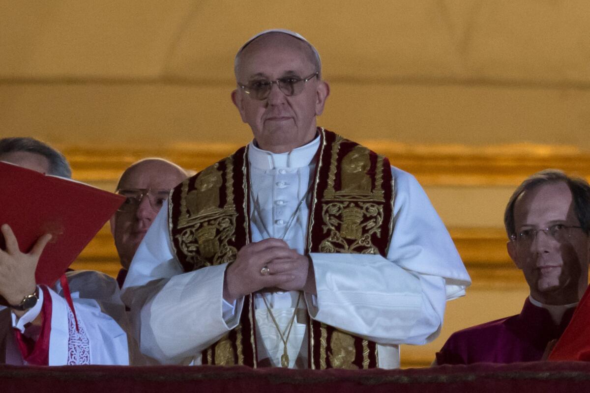 Argentina's Jorge Bergoglio, elected pope, appears at St. Peter's Basilica in Vatican City.
