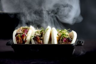 Smoking turns pork belly into "instant" bacon bao buns, with five-spice, sweet chili sauce and chili water, at International Smoke. 