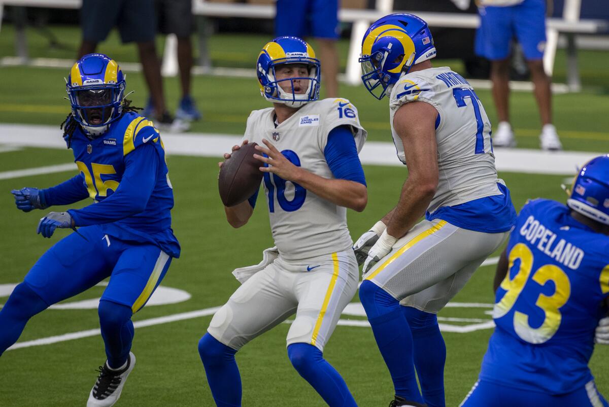 Rams quarterback Jared Goff looks to pass during a team scrimmage at SoFi Stadium in August.