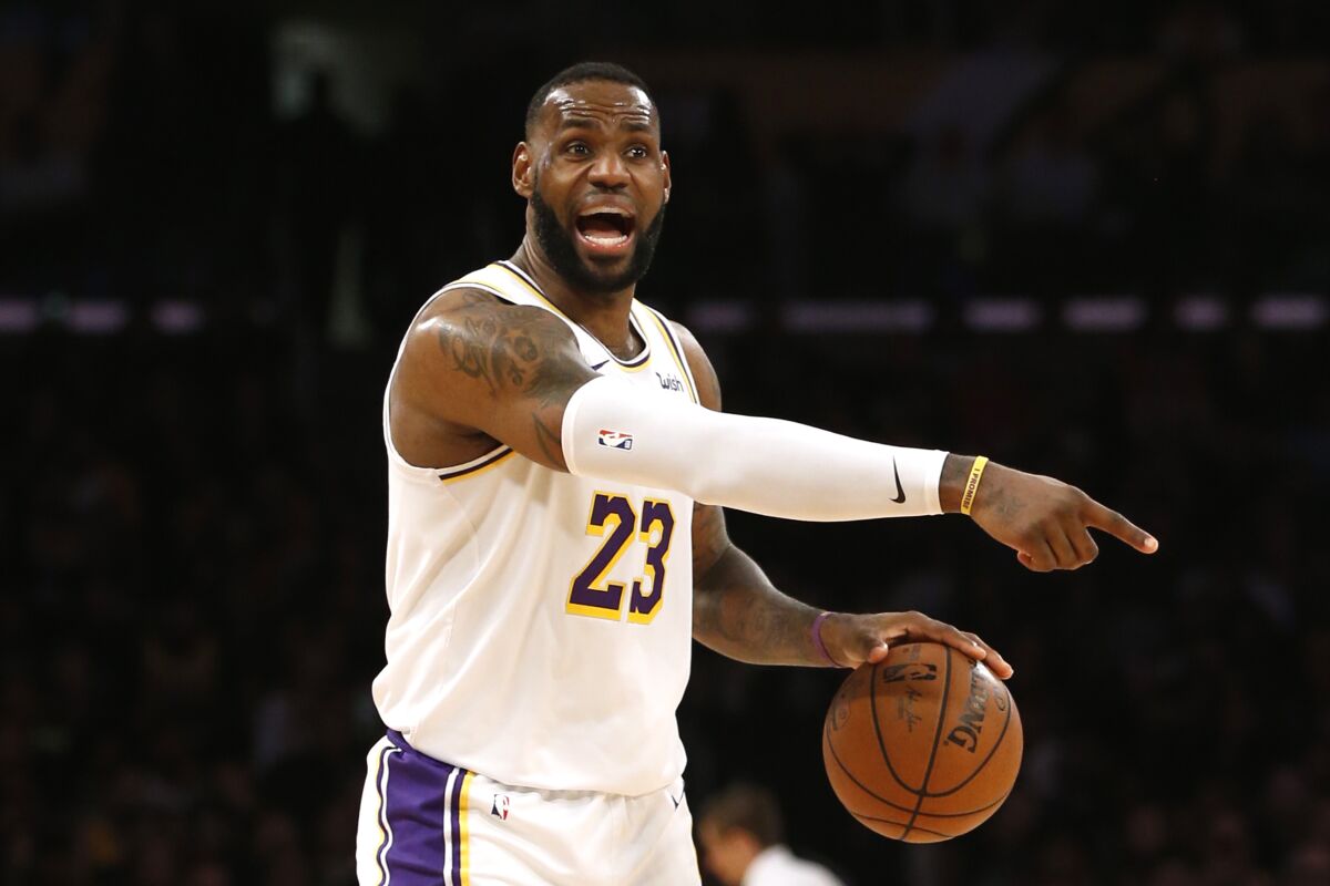 Lakers forward LeBron James calls out a play during a game against the Timberwolves on Dec. 8, 2019, at Staples Center.