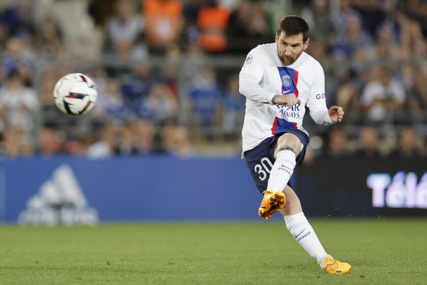 PSG's Lionel Messi kicks the ball during the French League One soccer match between Strasbourg and Paris Saint Germain at Stade de la Meinau stadium in Strasbourg, eastern France, Saturday, May 27, 2023. (AP Photo/Jean-Francois Badias)