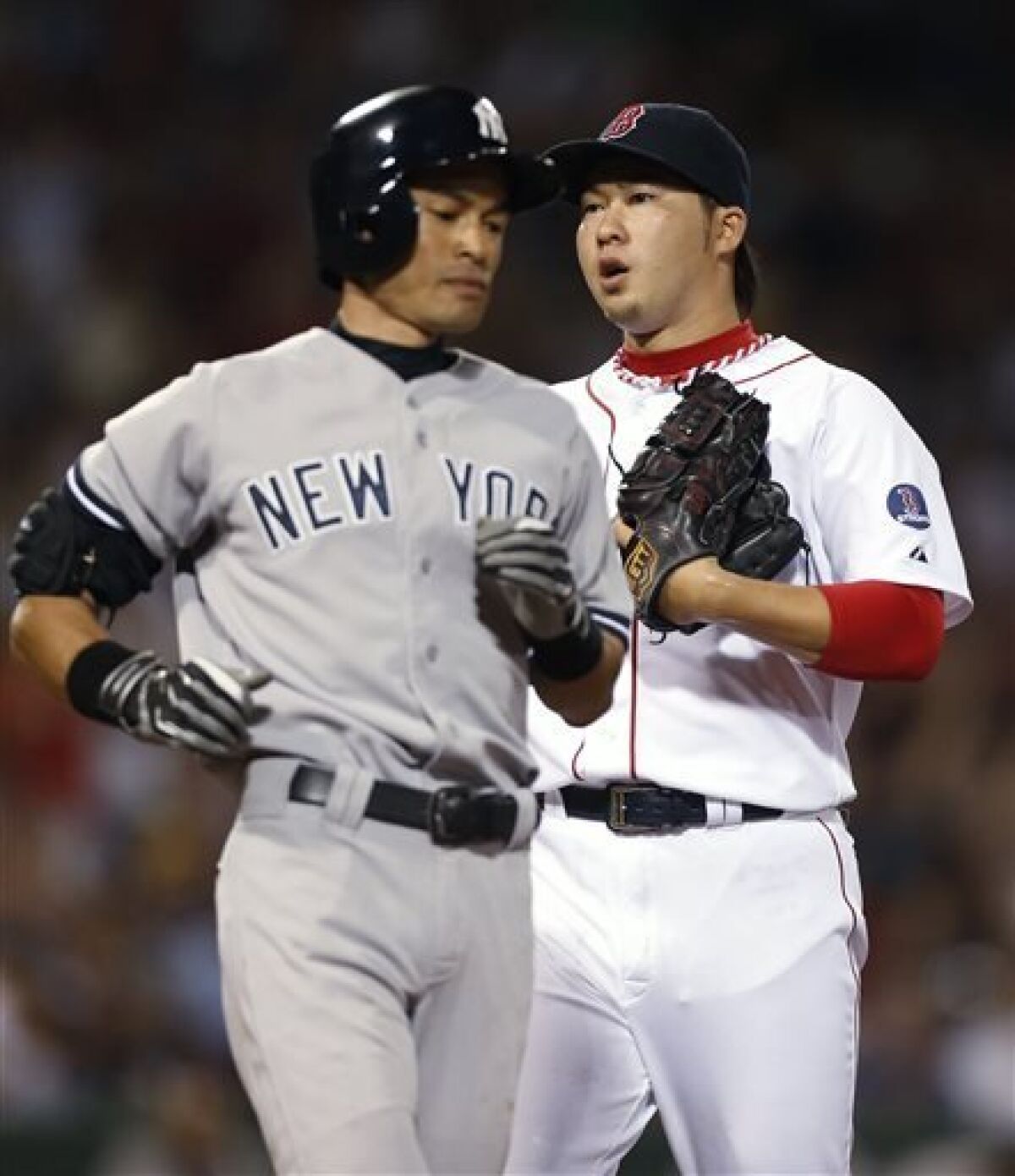 Napoli hits 2 HR and Red Sox beat Yankees 8-7 in 11