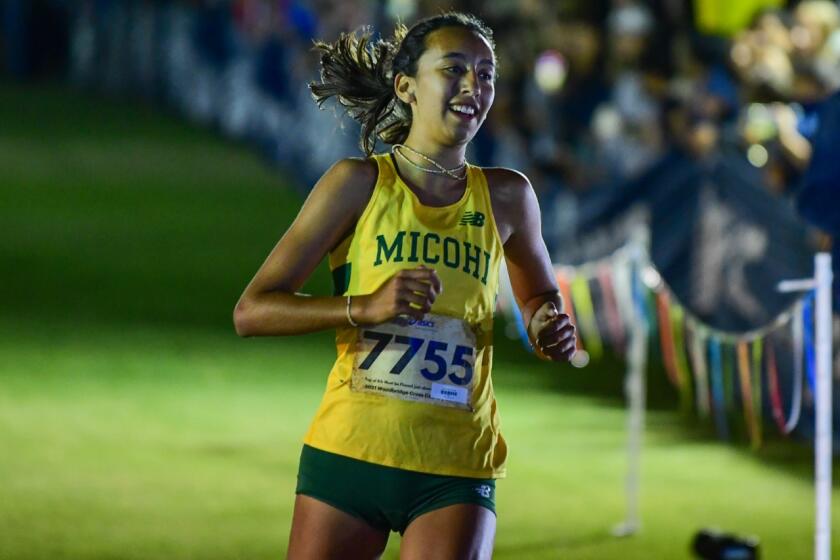 Dalia Frias of Mira Costa won the Woodbridge Invitational sweepstakes race.