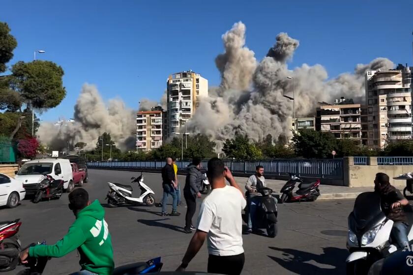 Israeli missile strike destroys apartment building in Beirut suburb