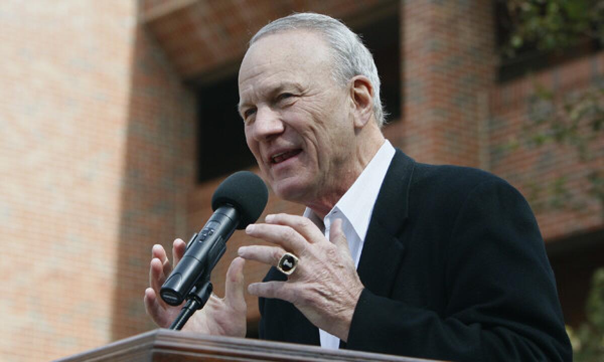 Former Oklahoma University football coach Barry Switzer speaks during the unveiling of a statue of himself on the Oklahoma campus in 2011.