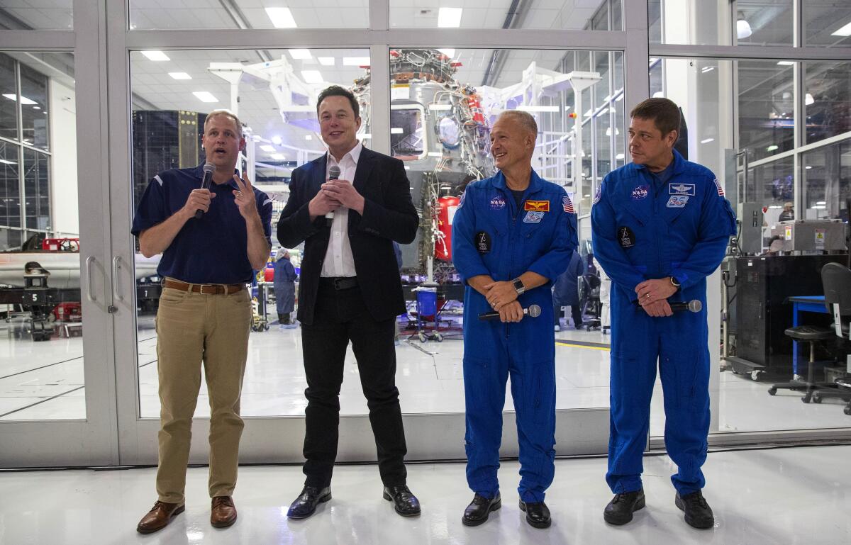 NASA's Jim Bridenstine, SpaceX CEO Elon Musk, NASA astronauts Doug Hurley and Bob Behnken at SpaceX