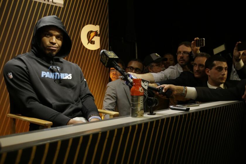 Carolina’s Cam Newton faces the media after Super Bowl 50 on Sunday.