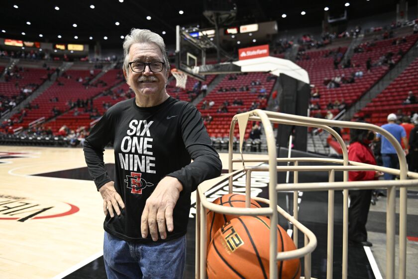 Dennis Brown poses before an NCAA college basketball game Friday, March 3, 2022 in San Diego. (Photo by Denis Poroy)