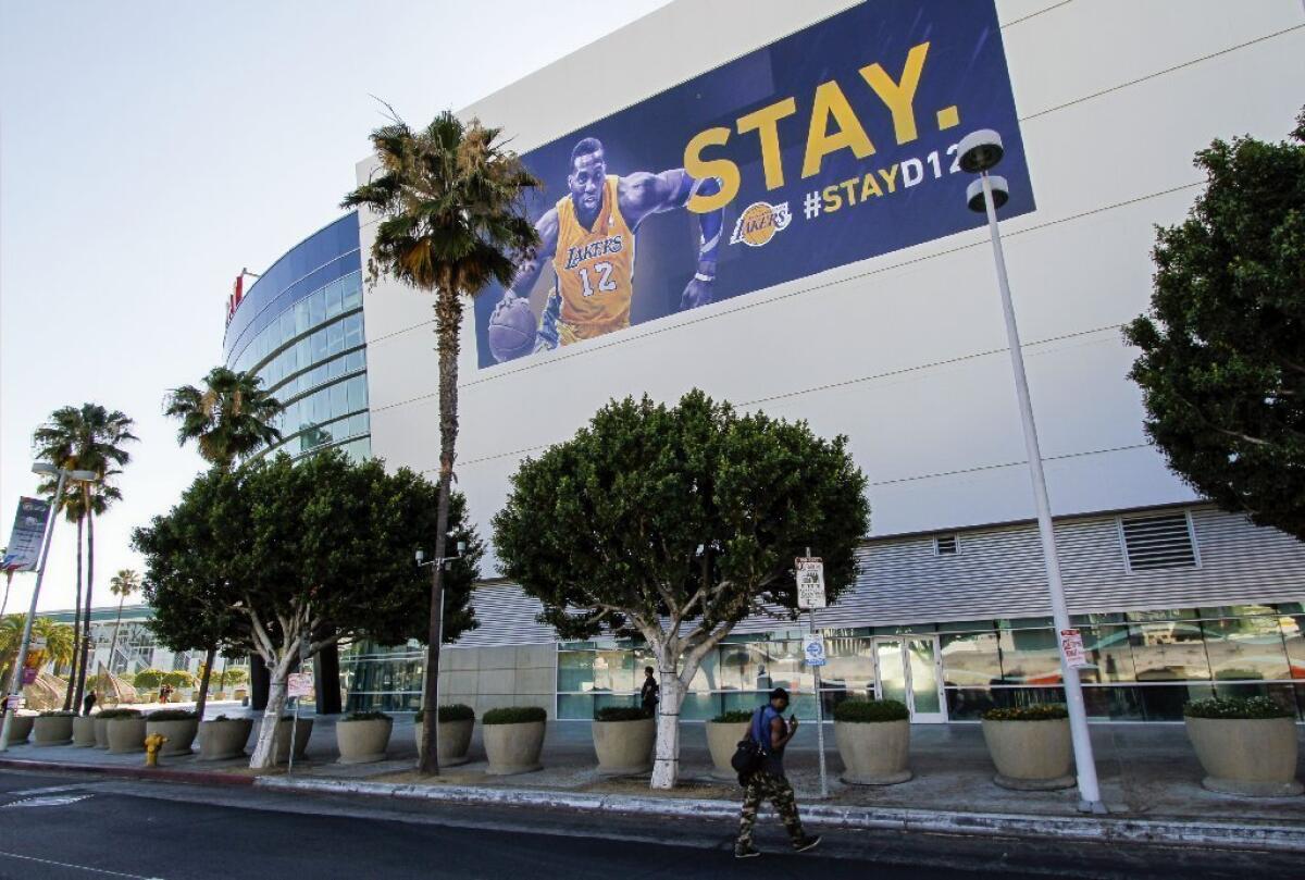 The Lakers hung a banner outside Staples Center asking Dwight Howard to remain with the team.