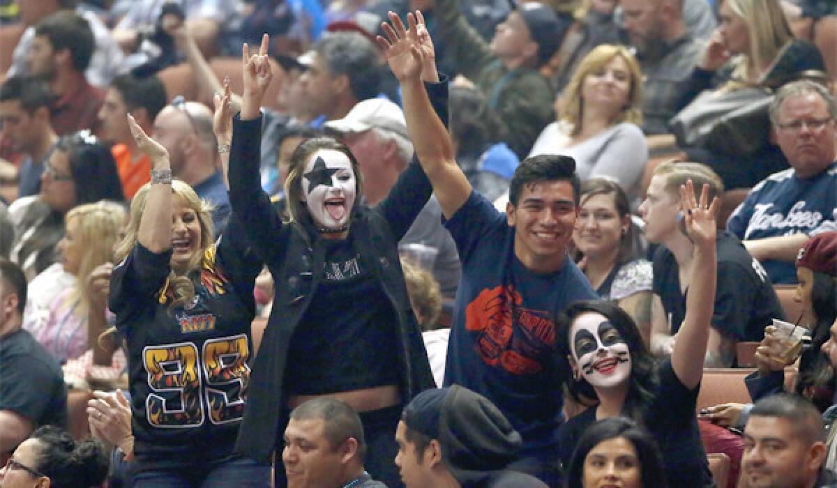 L.A. KISS fans got into the spirit of the night on Saturday for the new Arena Football League team's home opener at the Honda Center.