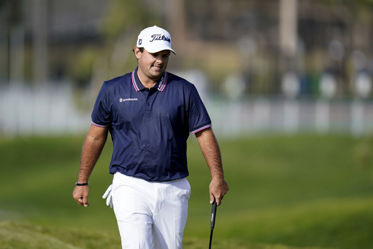Patrick Reed reacts after missing a putt on the ninth hole of the North Course in first round of the Farmers Insurance Open.