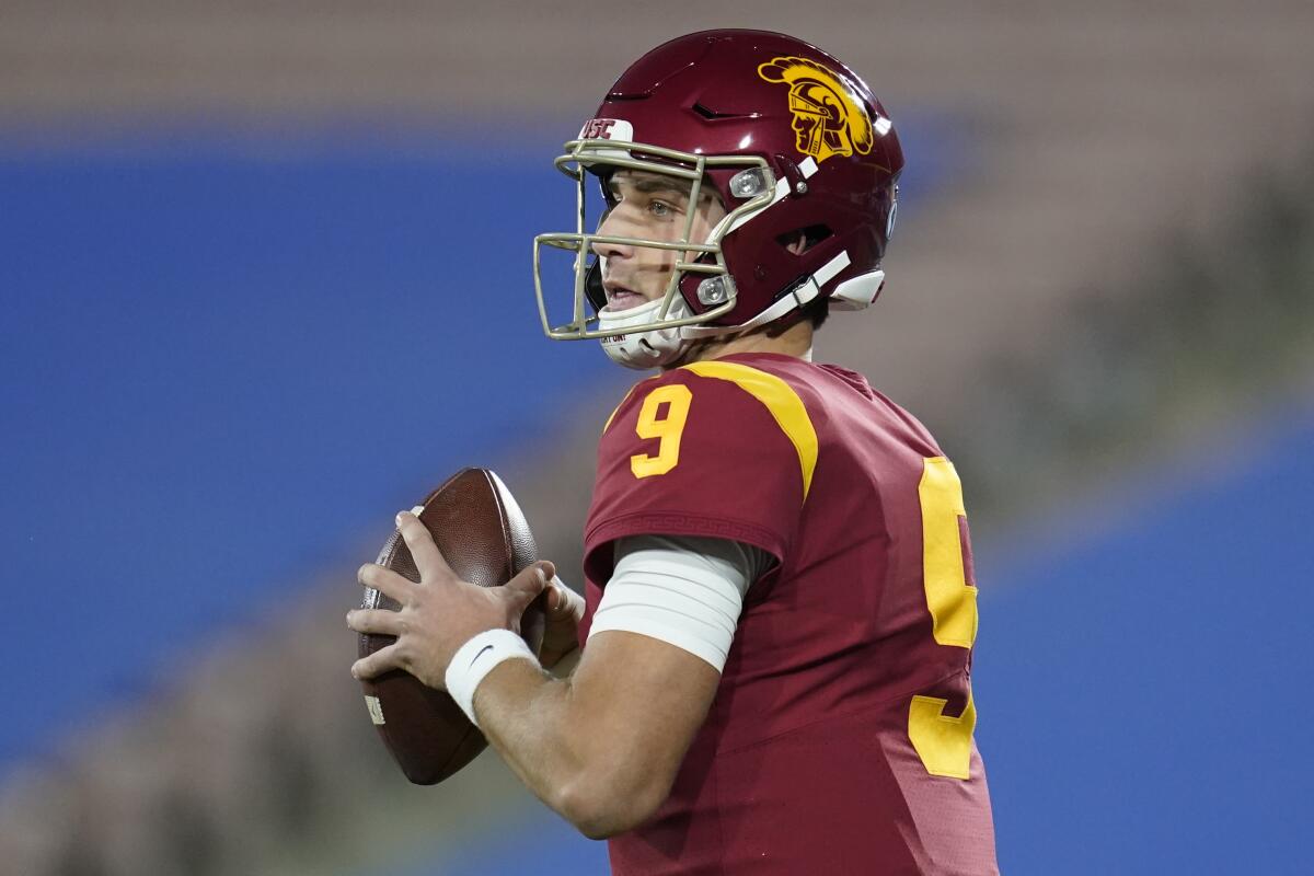 USC quarterback Kedon Slovis threw for five touchdowns and 344 yards with two interceptions.