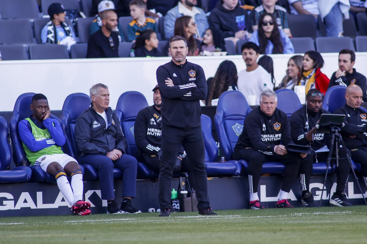 Galaxy coach Greg Vanney watches during the first half of a match against the Seattle Sounders in Carson.