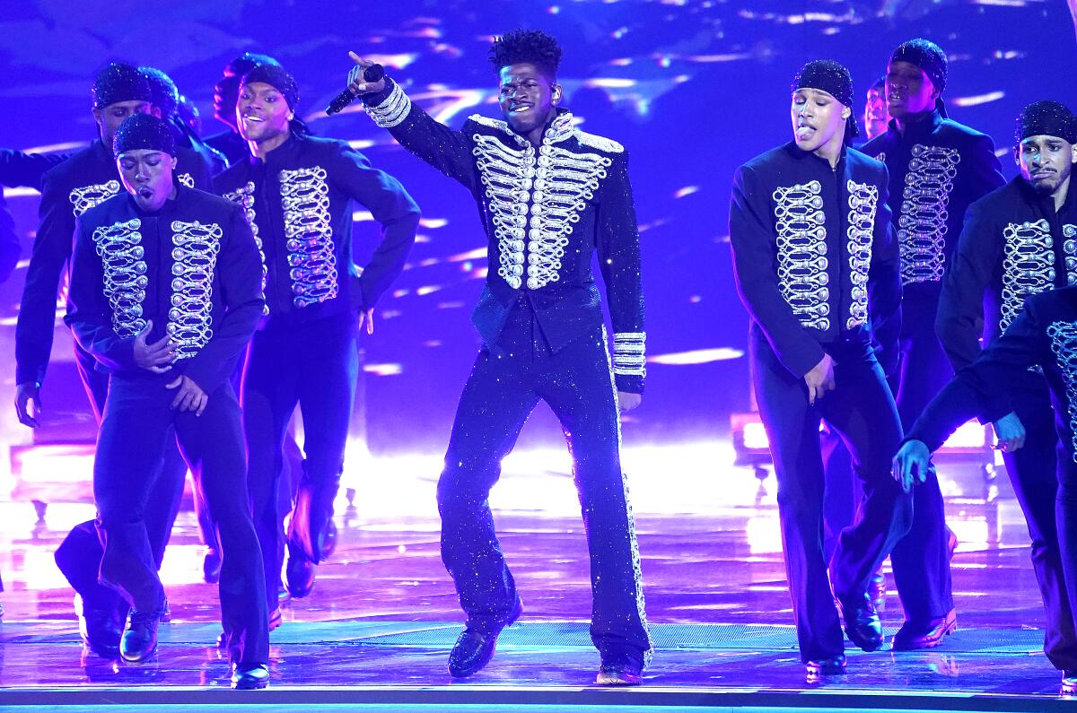 Lil Nas X performs a medley at the 64th Annual Grammy Awards.