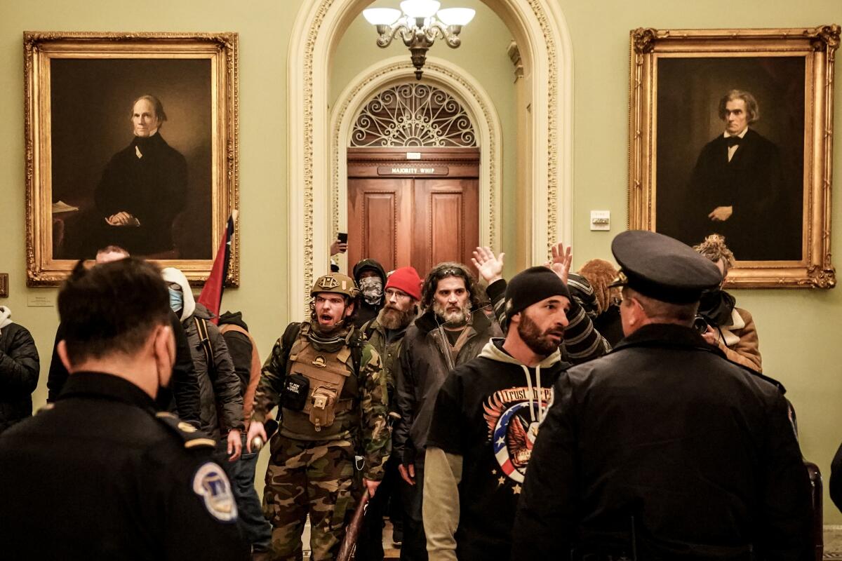Rioters confront officers at the U.S. Capitol on Jan. 6, 2021.