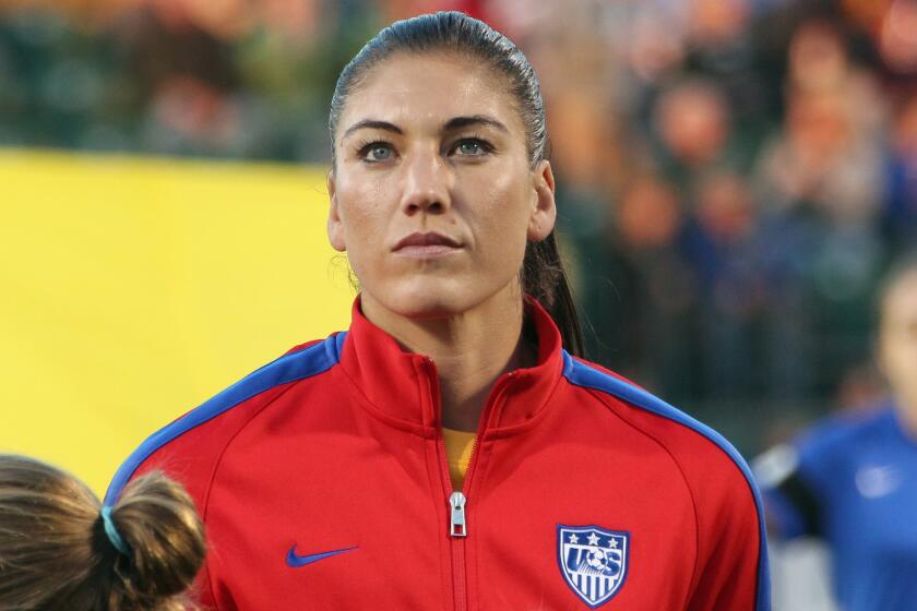 U.S. goalkeeper Hope Solo, shown last September, was reinstated to the women's national team last weekend after a 30-day suspension.