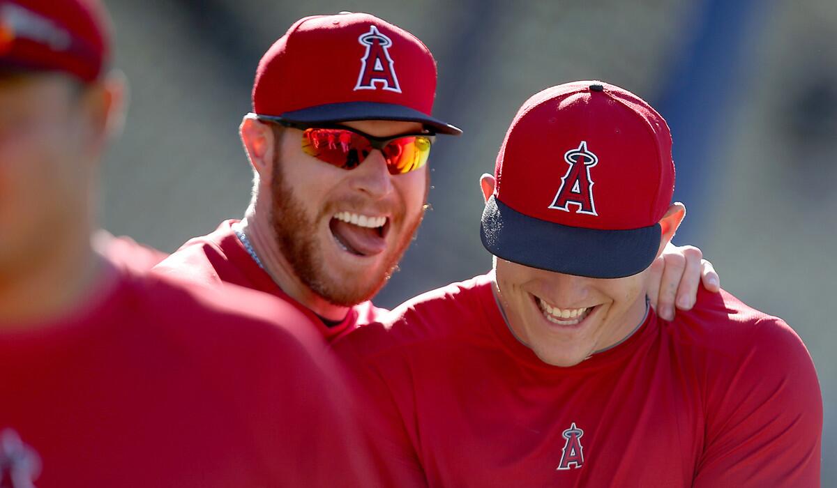 Although the Angels have lost seven of their last 10 games since clinching the AL West title, a bigger concern is whether slugger Josh Hamilton, center, will be healthy enough to contribute in the playoffs.