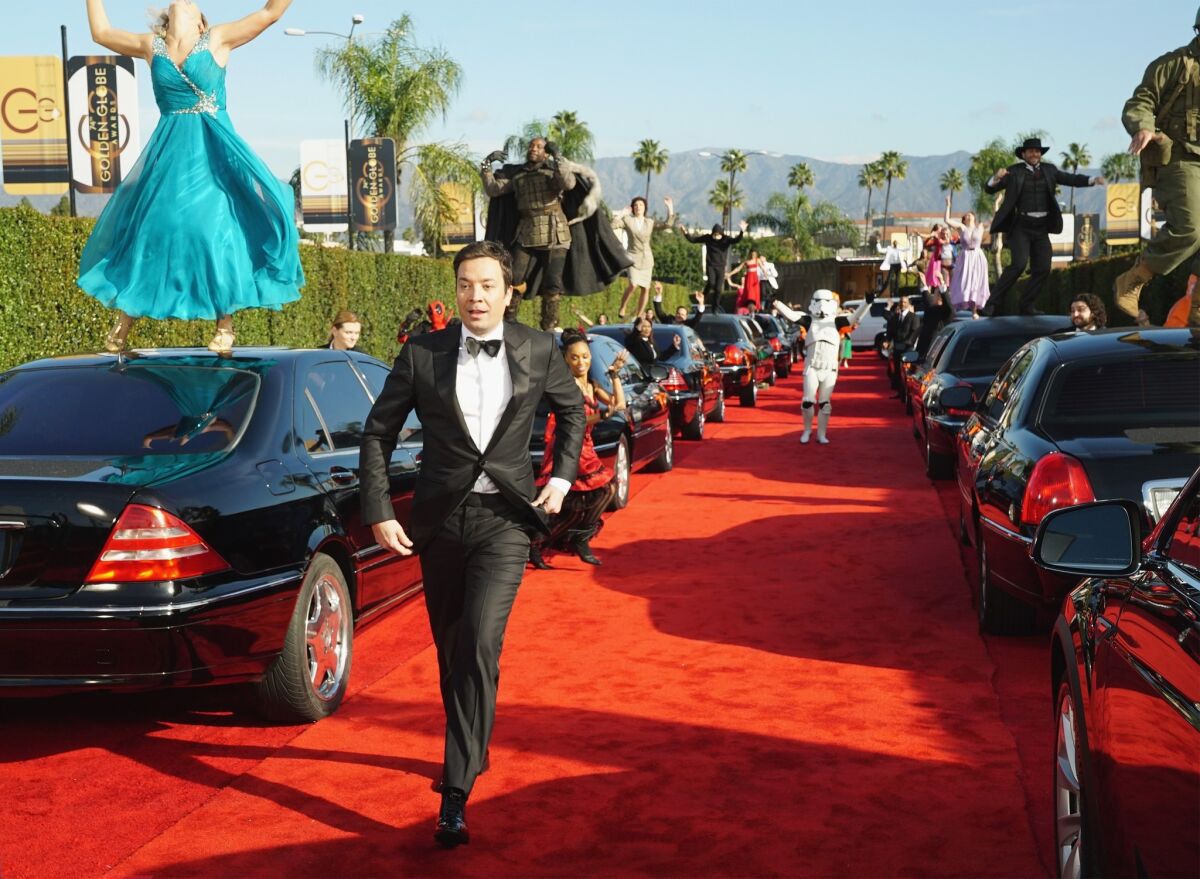 Host Jimmy Fallon performs in the opening sequence for the 74th Golden Globe Awards at the Beverly Hilton Hotel.