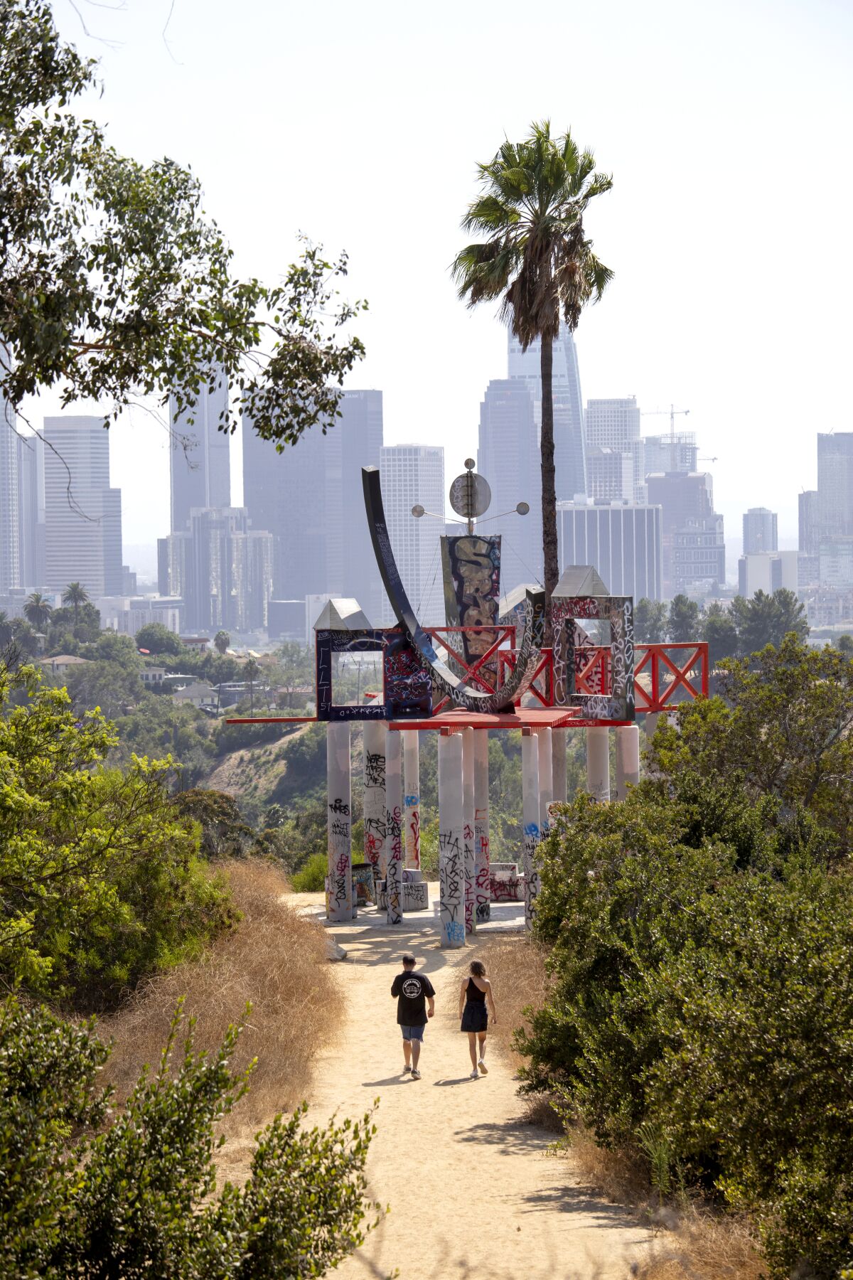 Peter Shire's large and whimsical art installation at Angels Point is a popular tourist attraction. But nearby, benches offer one of the best views of downtown L.A.'s skyline.