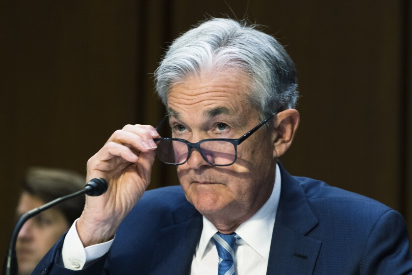 Federal Reserve Chairman Jerome Powell attends a news conference following an Open Market Committee meeting
