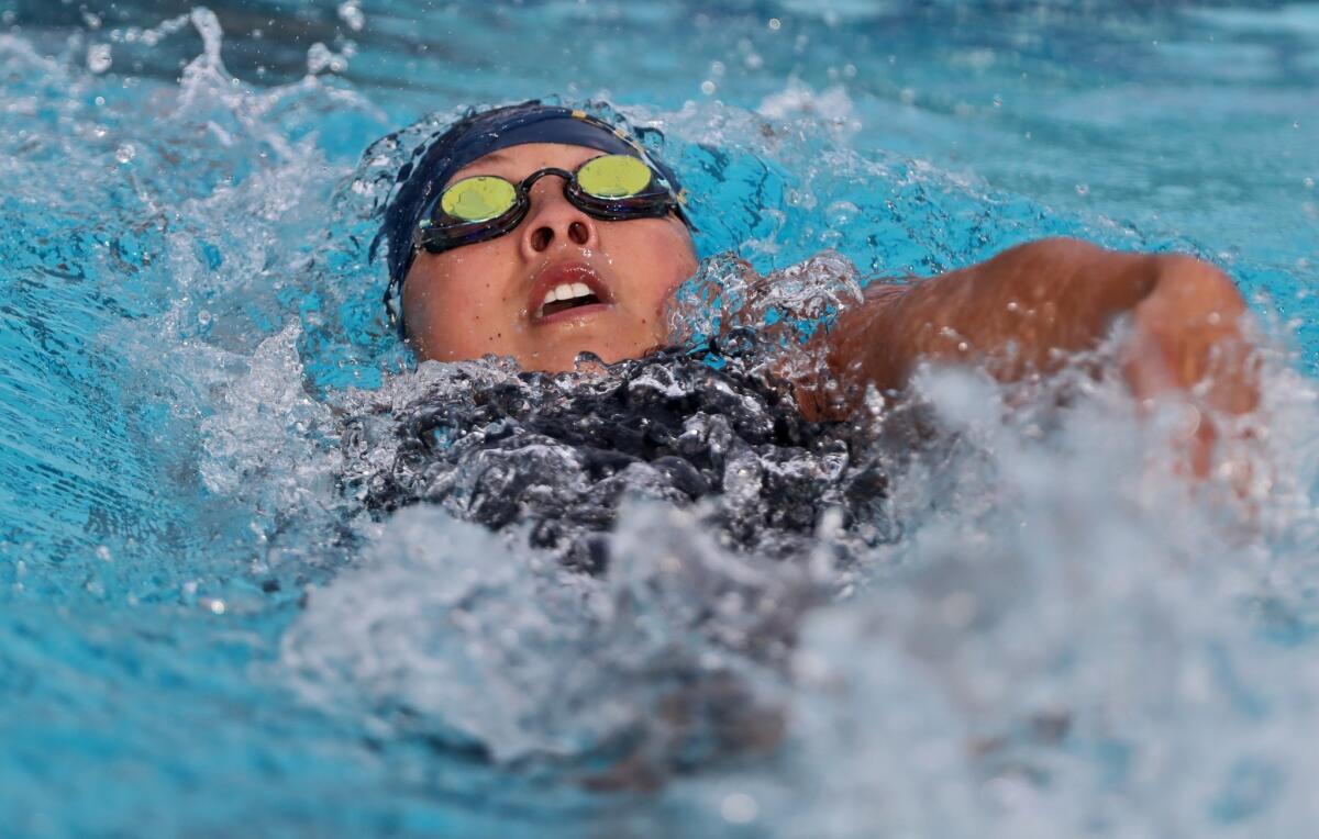 Marina High's Sage Matsushima swims in the girls' 100-yard backstroke at the CIF Southern Section Division 1 championships at Riverside City College on May 12, 2018.