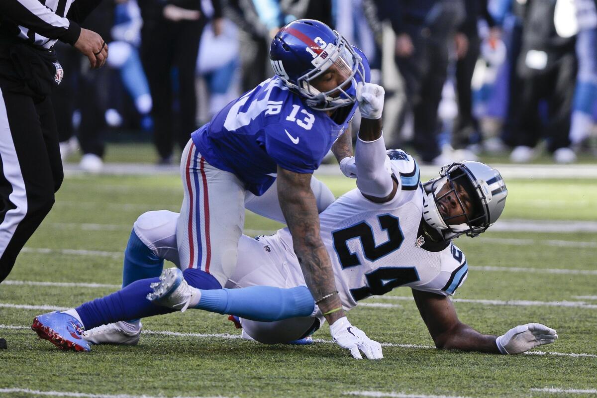 New York Giants' Odell Beckham (13) and Carolina's Josh Norman combined for five unsportsmanlike conduct penalties when the two teams played on Dec. 20.