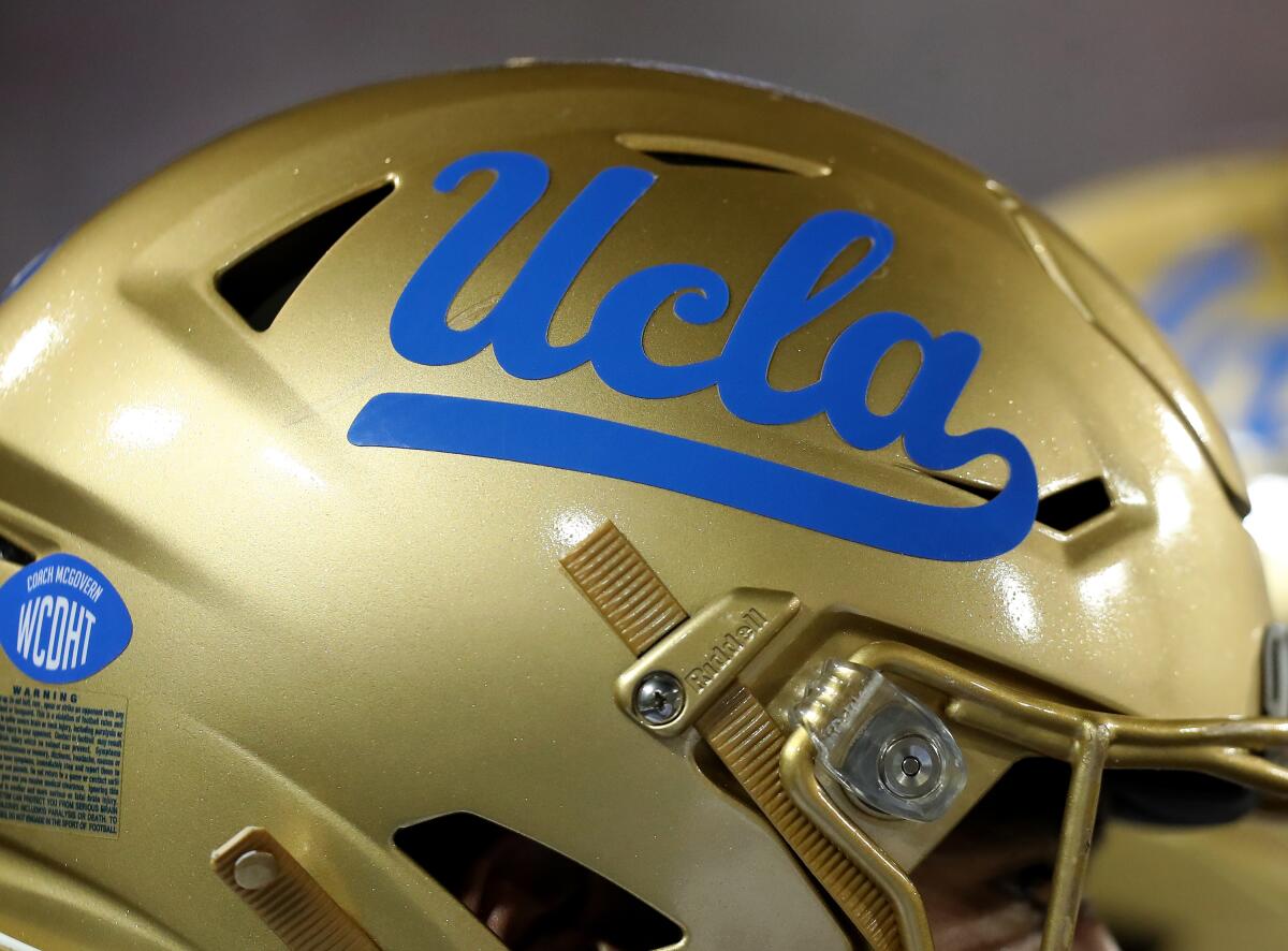Up close photo of a UCLA football helmet.
