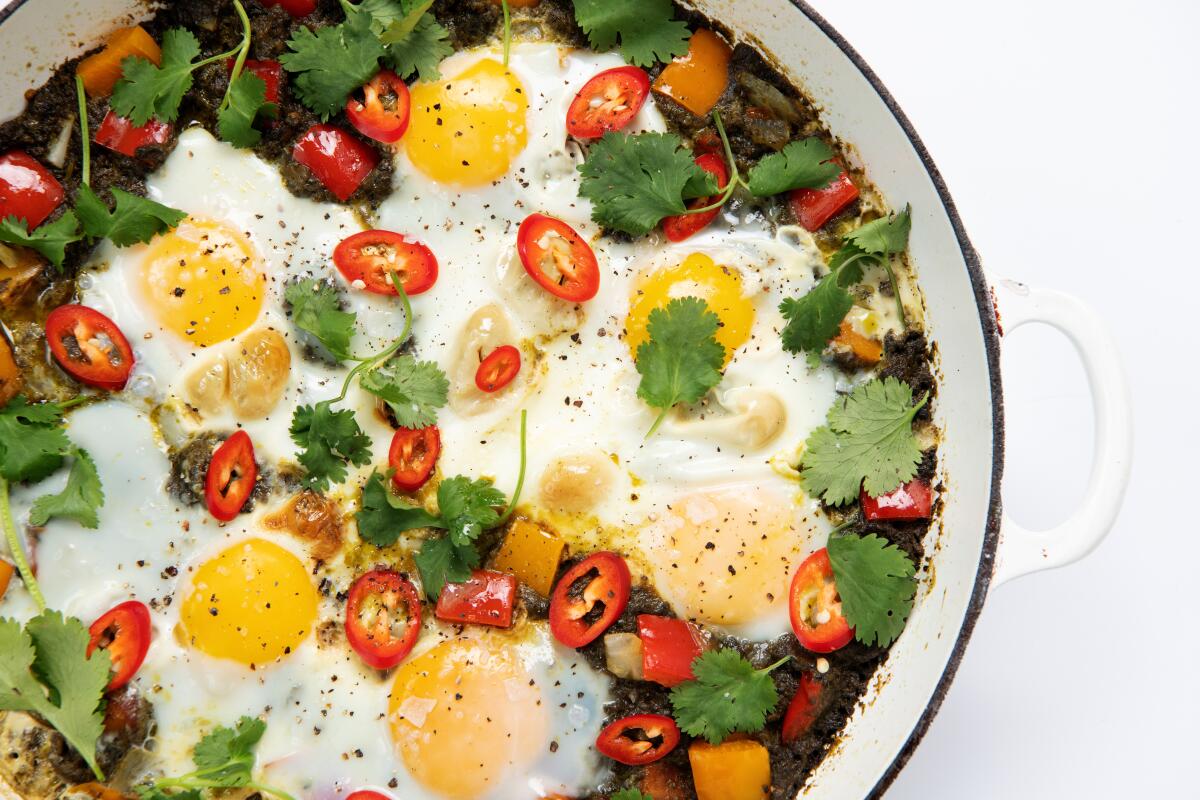 Palak or saag paneer make for a bright, greens-heavy version of shakshuka.