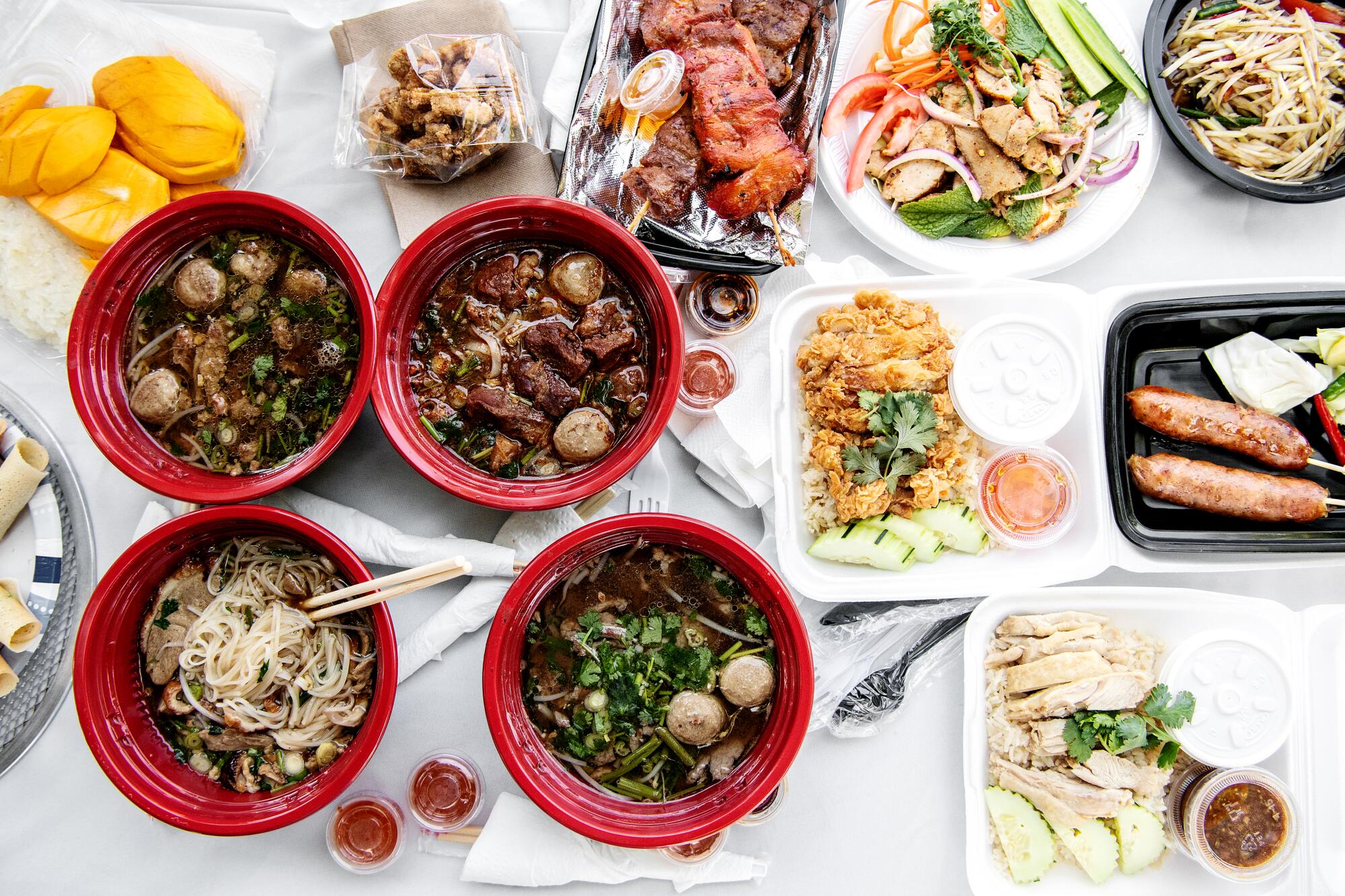 An array of Thai dishes available at a food market.