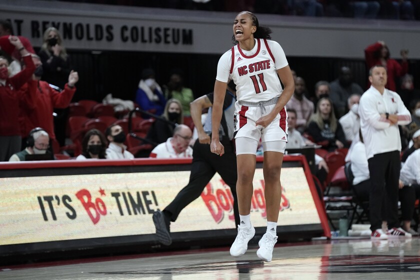 North Carolina State forward Jakia Brown-Turner (11) reacts following a basket against Louisville during the second half of an NCAA college basketball game in Raleigh, N.C., Thursday, Jan. 20, 2022. (AP Photo/Gerry Broome)