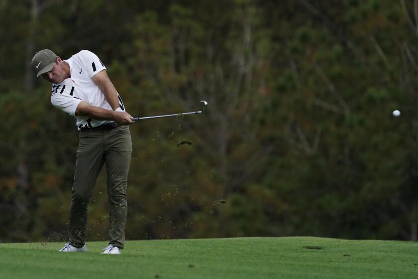 Paul Casey, of England, hits on the fifth fairway during the first round of the Masters golf tournament Thursday, Nov. 12, 2020, in Augusta, Ga. (AP Photo/Charlie Riedel)