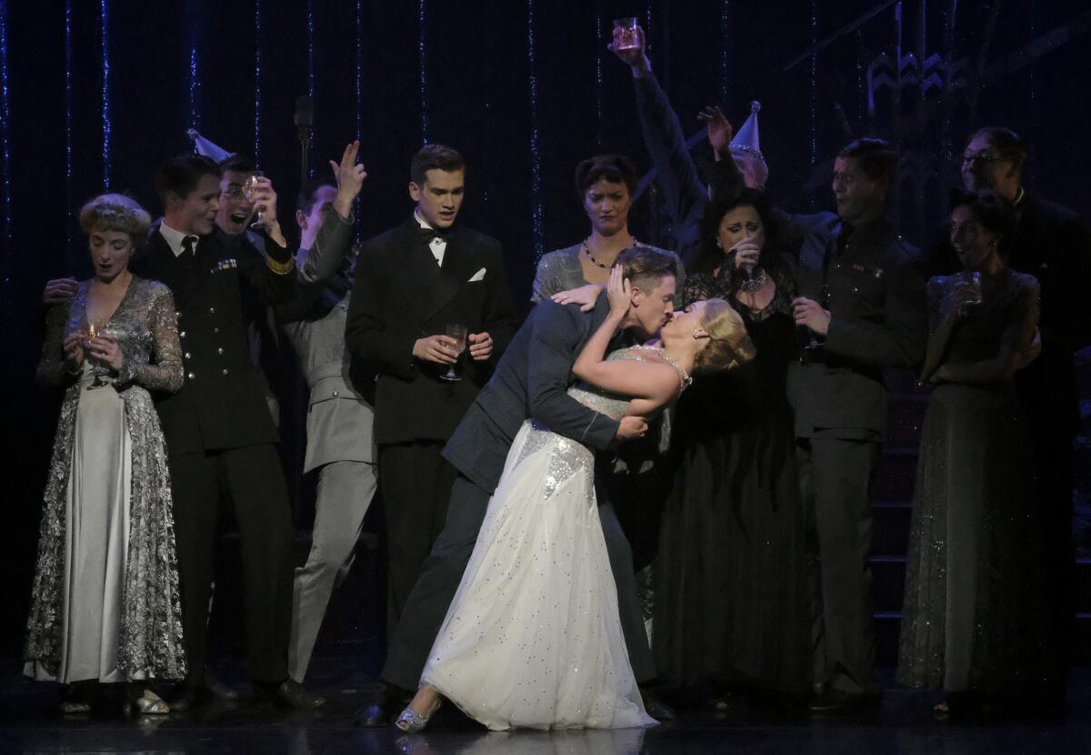 The pilot (Andrew Monaghan) dancing with Cinderella (Ashley Shaw).