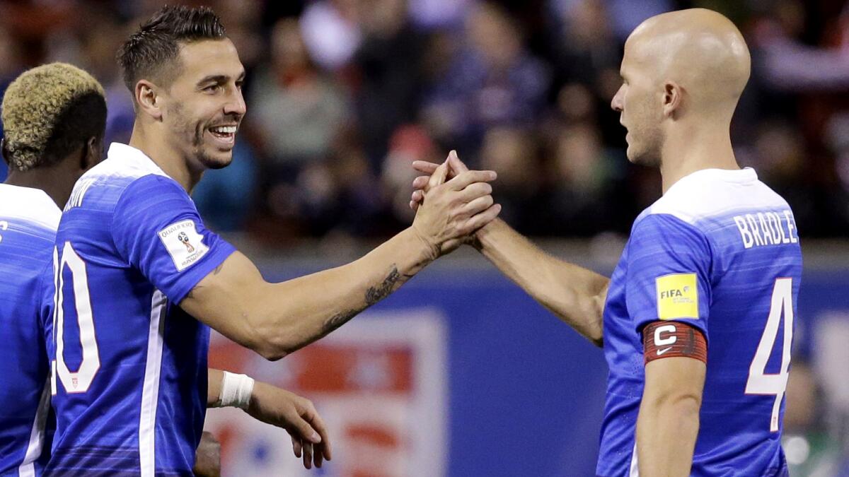 U.S. defender Geoff Cameron, left, is congratulated by midfielder Michael Bradley after scoring against St. Vincent and the Grenadines in a game on Nov. 13, 2015.