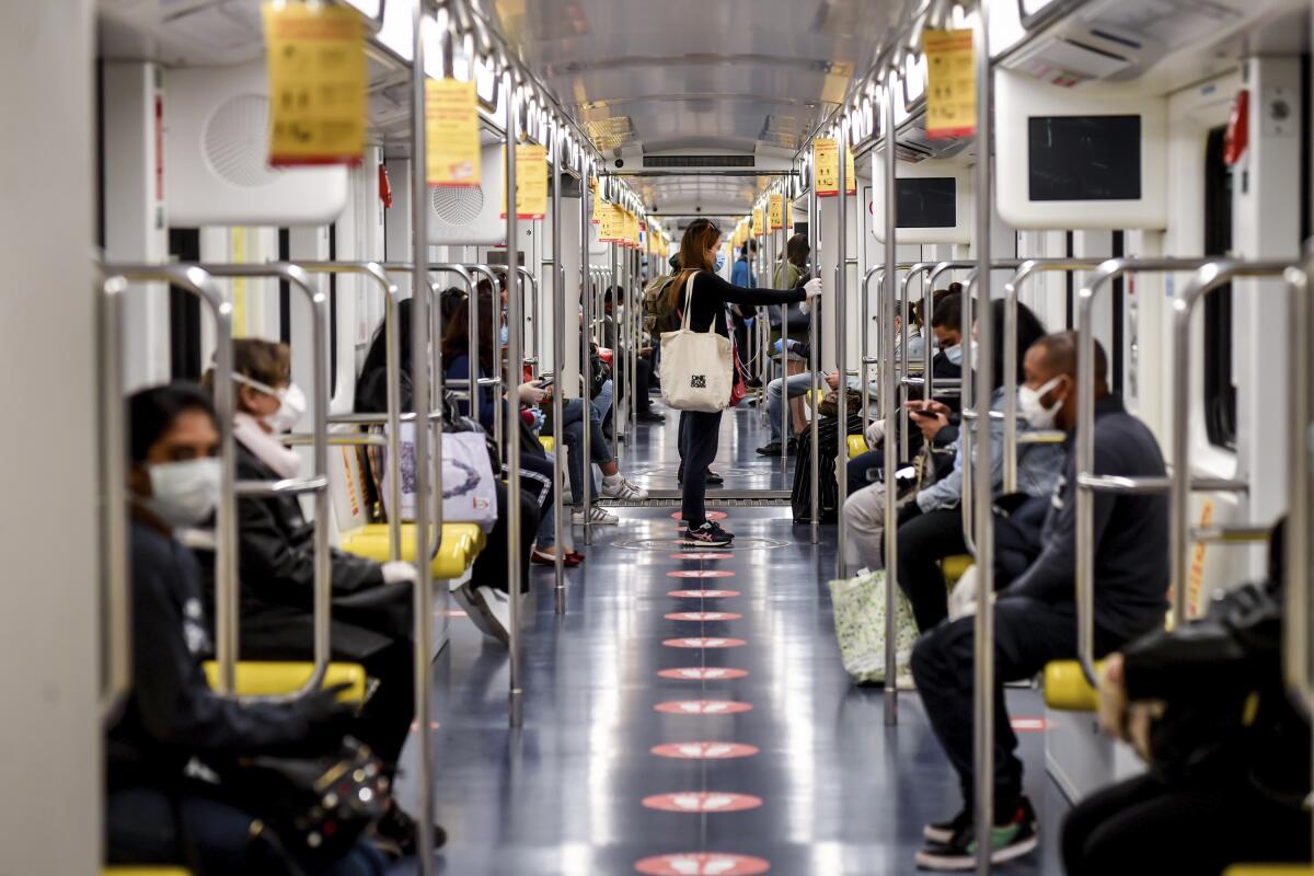 Subway passengers in Milan, Italy