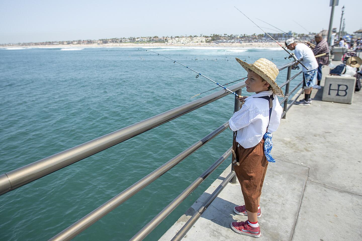 Huck Finn Fishing Derby lures young anglers in Huntington Beach - Los  Angeles Times