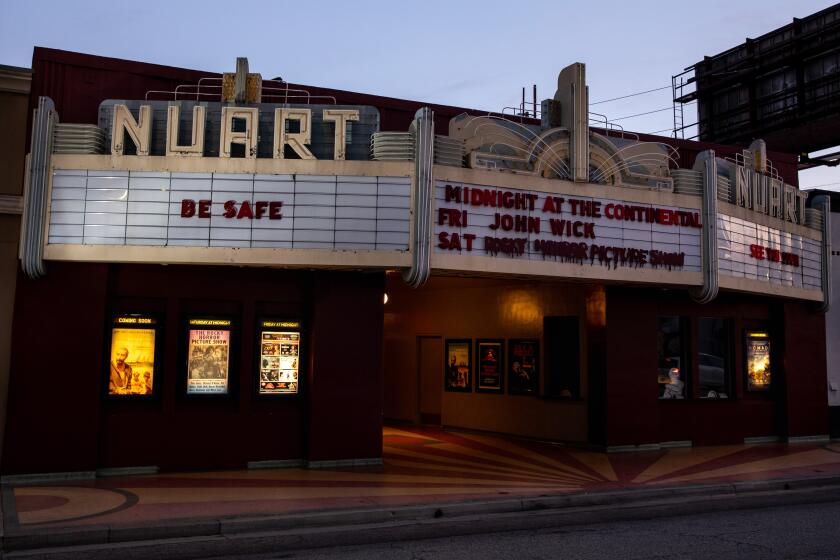 LOS ANGELES, CA - APRIL 18: The marquee of Landmark's Nuart Theatre is dark, with the message "Be Safe," during the coronavirus pandemic, photographed Saturday, April 18, 2020 in Los Angeles, CA. (Jay L. Clendenin / Los Angeles Times)
