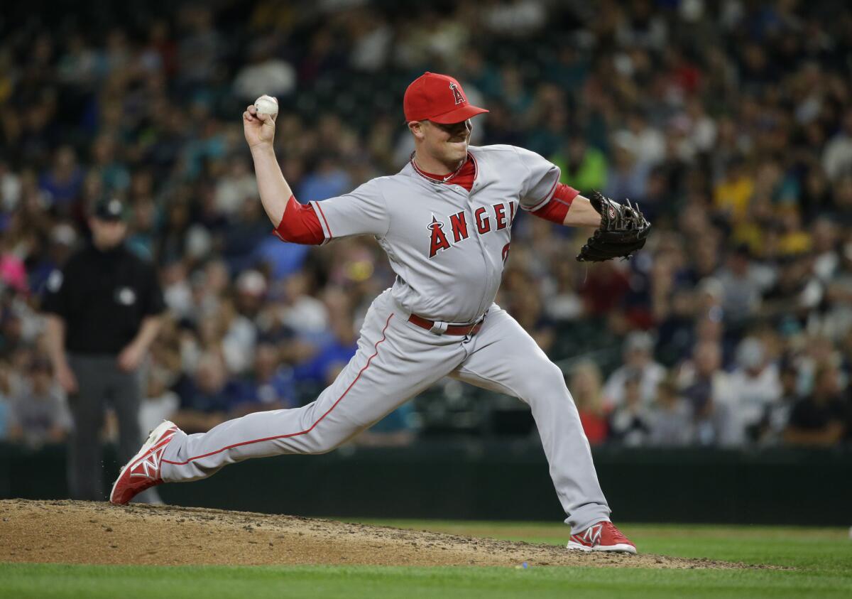 Angels reliever Joe Smith throws against the Mariners in the eighth inning on May 13.