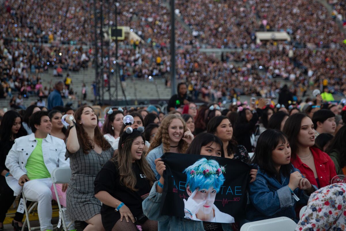 Fans of the K-pop boy band BTS inside the Rose Bowl.