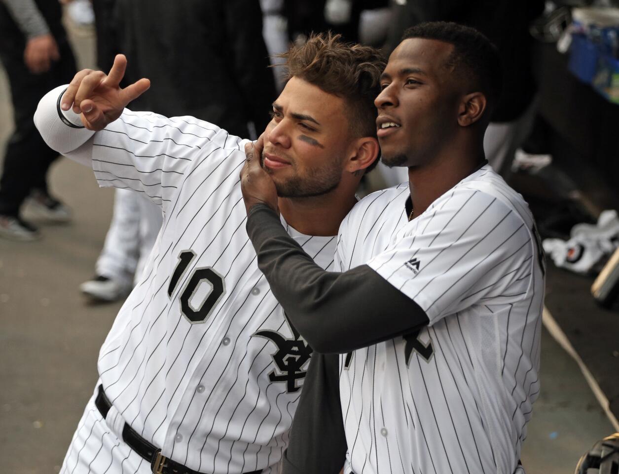 White Sox second baseman Yoan Moncada, left, and shortstop Tim Anderson mug for the video board camera before the start of a game against the Rangers at Guaranteed Rate Field on Saturday, May 19, 2018.