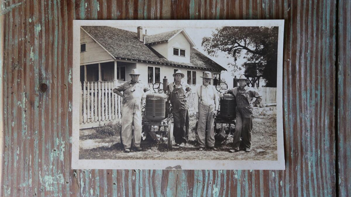 An old photo of the Schneider family who owned the Schneider Dance Hall in Columbus, Texas. The hall now hosts weddings and other events. (Katie Falkenberg / Los Angeles Times)