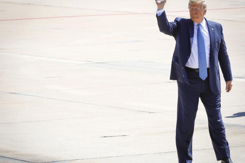 President Donald Trump waves to the well-wishers who were at Marine Corps Air Station Miramar to greet him when he arrived aboard Air Force One, September 18, 2019, in San Diego for a fundraiser, roundtable discussion and a trip to the border wall in Otay Mesa that separates San Diego from Tijuana, Mexico.