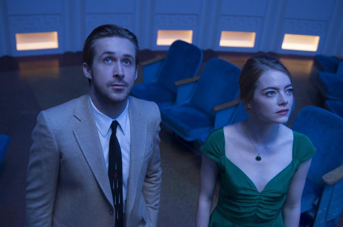Ryan Gosling and Emma Stone in a scene from "La La Land." The film is nominated for seven Golden Globe Awards,including best motion picture musical or comedy.
