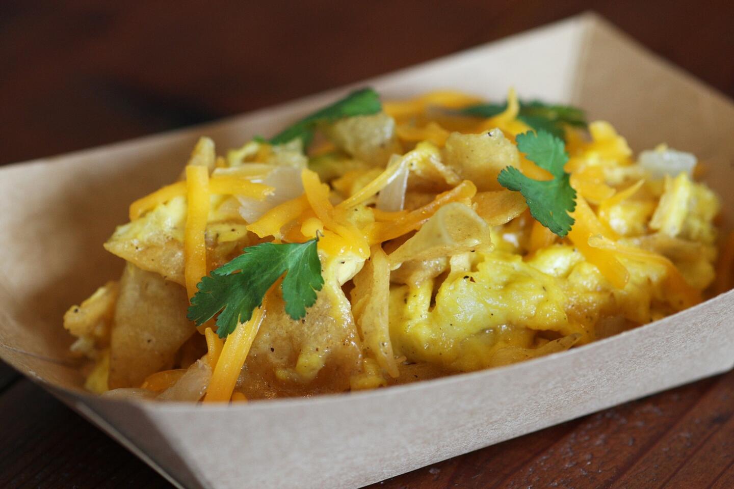 At HomeState, A Texas Kitchen, Austin native Briana Valdez serves up eggs in breakfast tortillas and in migas -- eggs sort scrambled with crispy corn tortilla strips, onions and cheddar cheese.
