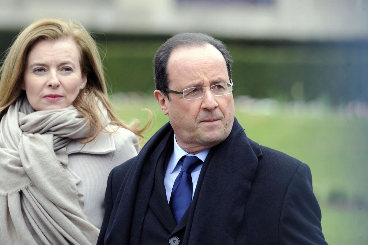French President Francois Hollande and his partner Valerie Trierweiler shown leaving the Prefecture of Correze in Tulle last April. Closer magazine has reported that Hollande has been having an affair with actress Julie Gayet.